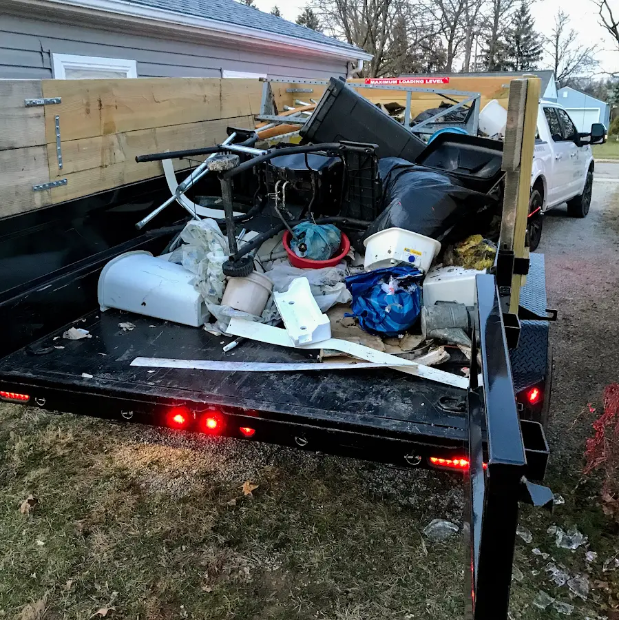 Roll-off dumpster delivered to a residential driveway in Verona